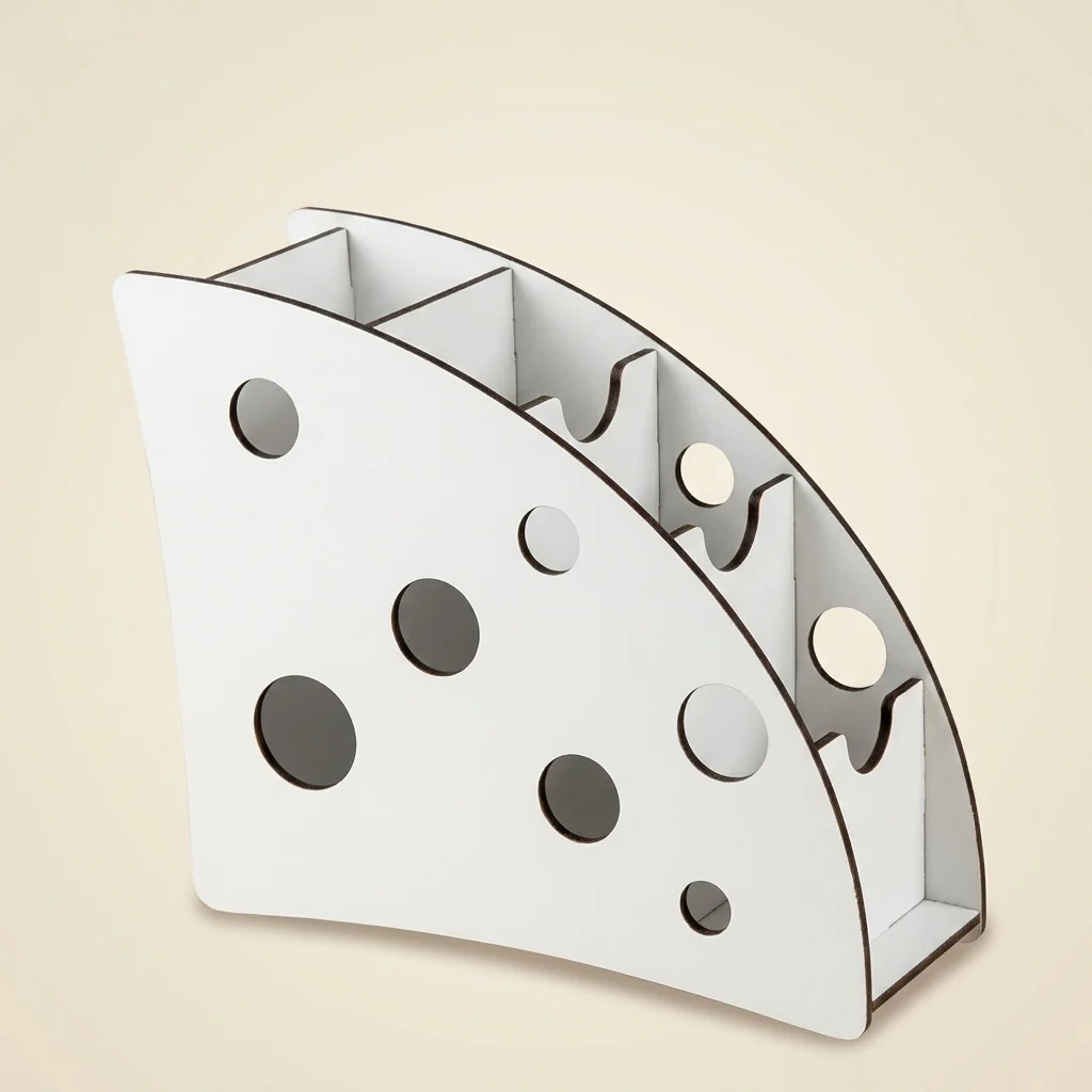 Revistero con perforaciones circulares estilo queso